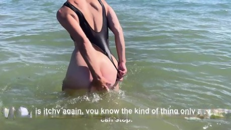 On the public beach, my husband has to keep the chastity cage